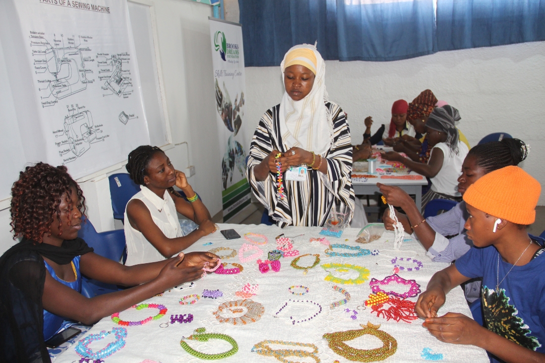 Brooks Dreams Foundation beads making class in session